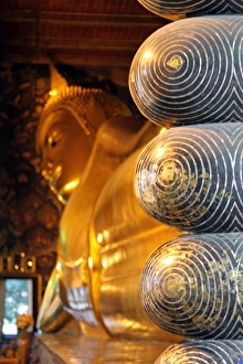 Golden Buddha statues at Wat Pho temple, Bangkok, Thailand