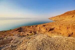 Amman and Jordan Collection: Barren shoreline and salt water of the Dead Sea, Jordan