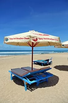 Bali, Indonesia Collection: Beach umbrellas and deckchairs on Legian Beach, Denpasar, Bali, Indonesia
