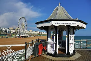 Brighton Pier and Ferris Wheel beside the beach, England, UK Brighton Pier and Ferris Wheel beside the beach, England, UK