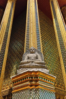 Buddha Statue on Phra Mondop, Wat Phra Kaew, Temple of the Emerald Buddha Complex, Bangkok, Thailand Buddha Statue on Phra Mondop, Wat Phra Kaew, Temple of the Emerald Buddha Complex, Bangkok, Thailand
