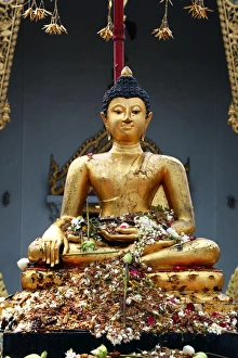 Buddha statue at Wat Phra Singh Temple in Chiang Mai, Thailand Buddha statue at Wat Phra Singh Temple in Chiang Mai, Thailand