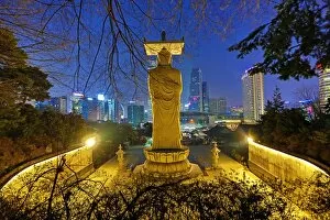 Images Dated 27th March 2016: City skyline and Buddha statue at Bongeunsa Temple, Seoul, Korea