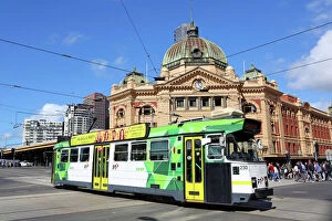 Australia Collection: City tram passing Flinders Street Station, Melbourne, Victoria, Australia