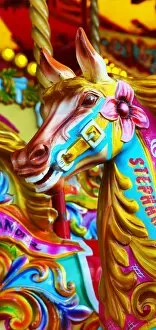 Perfect for Phone Covers Collection: Colourful painted horses on a fairground carousel