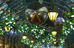 Covent Garden Christmas decorations and lights shaped like mistletoe in London Covent Garden Christmas decorations and lights shaped like mistletoe in London