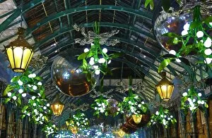 Christmas 2016 Collection: Covent Garden Christmas decorations and lights shaped like mistletoe in London