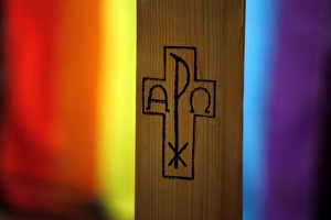 Cross on rainbow background
