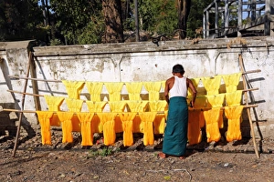 Dyeing and drying coloured yarn for the weaving industry in Amarapura, Mandalay, Myanmar Dyeing and drying coloured yarn for the weaving industry in Amarapura, Mandalay, Myanmar