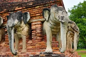 Sukhotai, Thailand Collection: Elephant statues on Wat Sorasak Temple, Sukhotai, Thailand