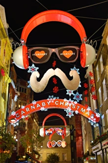 Face and headphones Christmas decorations Carnaby Street, London Face and headphones Christmas decorations Carnaby Street, London