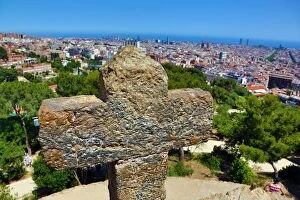 Barcelona, Spain Collection: General view of the city skyline and a cross from Parc Guell park in Barcelona, Spain
