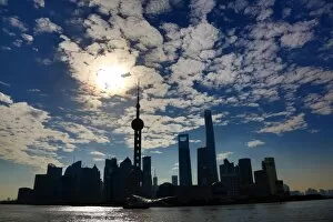 Images Dated 8th April 2015: General view of the Pudong city skyline in Shanghai in silhouette with the Oriental Pearl TV