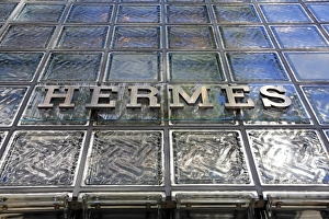 Glass front and logo on the Japanese Hermes shop building in Ginza, Tokyo, Japan Glass front and logo on the Japanese Hermes shop building in Ginza, Tokyo, Japan