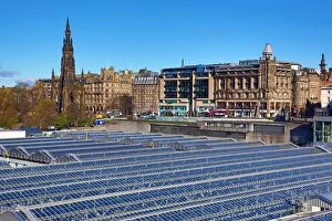 Images Dated 30th April 2016: Glass panels on the roof of Waverley Station and the Scott Monument in Edinburgh