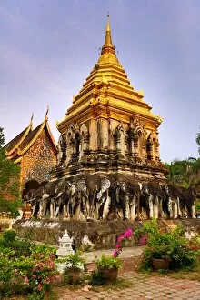 Thai Temples Collection: Gold chedi decorated with elephants in Wat Chiang Man Temple in Chiang Mai, Thailand