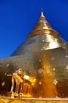 Chiang Mai Collection: Gold elephant statue on the chedi at Wat Phra Singh Temple in Chiang Mai, Thailand