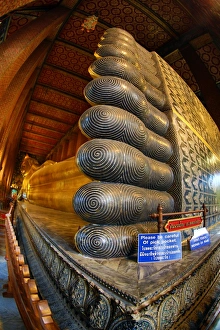 Golden Buddha statues at Wat Pho temple, Bangkok, Thailand