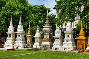 Vientiane, Laos Collection: Graves in a cemetery at Wat Si Saket Buddhist Temple, Vientiane, Laos