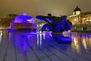 Illuminated fountains in Trafalgar Square, London