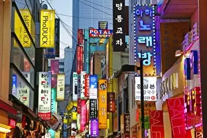 Images Dated 24th March 2016: Illuminated shop signs of the shopping streets in Myeongdong in Seoul, Korea
