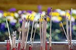 Images Dated 1st June 2013: Incense sticks burning at a Buddhist temple, Bangkok, Thailand