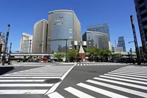 Images Dated 8th April 2013: Japanese street scene of modern buildings and a pedestrian crossing in Ginza, Tokyo, Japan