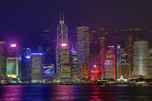 Hong Kong Skyline Collection: Lights of the city skyline of Central across Victoria Harbour at night in Hong Kong