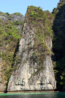 Limestone cliffs on Ko Phi Phi Don island beach, Andaman Sea, Thailand Limestone cliffs on Ko Phi Phi Don island beach, Andaman Sea, Thailand
