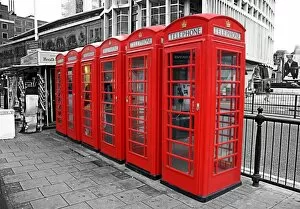 Spot Colour Collection: Line of red telephone boxes in London, England, spot colour
