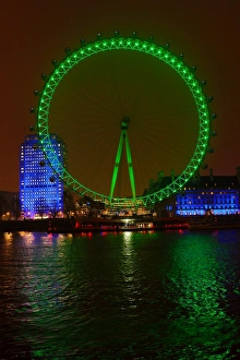 The London Eye goes green to celebrate St. Patricks Day in London, England