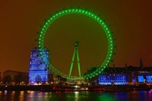 The London Eye goes green to celebrate St. Patricks Day in London, England