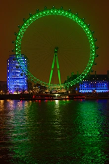 The London Eye goes green to celebrate St. Patricks Day in London, England