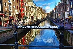 Majoor Bosshardtbrug bridge over the canal in Oudezijds Achterburgwal in Amsterdam, Holland Majoor Bosshardtbrug bridge over the canal in Oudezijds Achterburgwal in Amsterdam, Holland