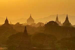 Images Dated 1st February 2016: Misty Temples and pagodas at sunset in Bagan, Myanmar (Burma)