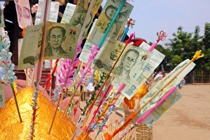 Money gift offering at Wat Phan Tao Temple in Chiang Mai, Thailand Money gift offering at Wat Phan Tao Temple in Chiang Mai, Thailand