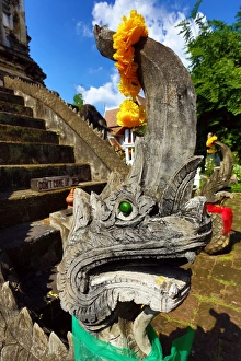 Naga snake statue at Wat Chiang Man Temple in Chiang Mai, Thailand Naga snake statue at Wat Chiang Man Temple in Chiang Mai, Thailand