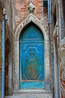 Venice Collection: Old blue door in a stone wall in Venice, Italy