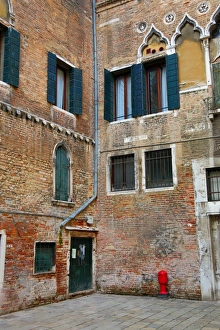 Old Italian architecture of a building in a square in Venice, Italy Old Italian architecture of a building in a square in Venice, Italy