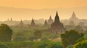Bagan, Myanmar Collection: Pagodas at sunset on the Central Plain of Bagan, Myanmar
