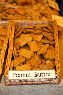 Peanut Butter bane shaped dog biscuits on sale at the London Pet Show 2013 Peanut Butter bane shaped dog biscuits on sale at the London Pet Show 2013