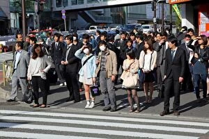 Images Dated 8th April 2013: People waiting at a pedestrain crossing to cross a road in Shinjuku, Tokyo, Japan