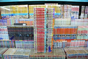 Pile of Thai books at a book stall at Chatuchak Weekend Market, the largest market in Thailand, Bangkok, Thailand Pile of Thai books at a book stall at Chatuchak Weekend Market, the largest market in Thailand, Bangkok, Thailand