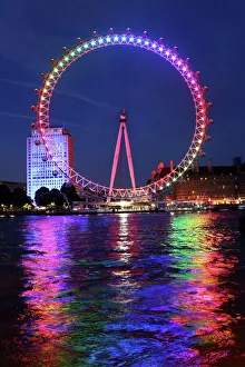 Rainbow coloured London Millennium Eye illuminated for Gay Pride Rainbow coloured London Millennium Eye illuminated for Gay Pride