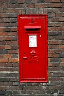 Red Collection: Red English Post Box in a brick wall