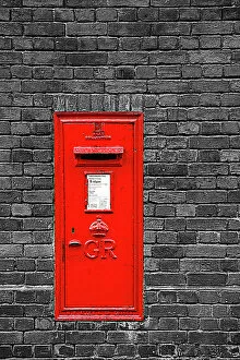 Editor's Picks: Red English Post Box in a brick wall
