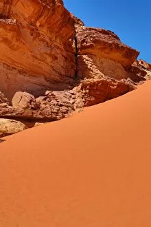 Amman and Jordan Collection: Red sand dune in the desert at Wadi Rum, Jordan