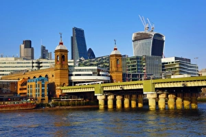River Thames with Cannon Street railway bridge and the City of London skyline in London, England River Thames with Cannon Street railway bridge and the City of London skyline in London, England