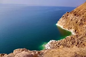 Amman and Jordan Collection: Salt deposits on the rocky shoreline of the Dead Sea, Jordan