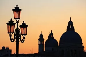 Images Dated 10th February 2013: Santa Maria Della Salute and a lamp post at sunset in Venice, Italy